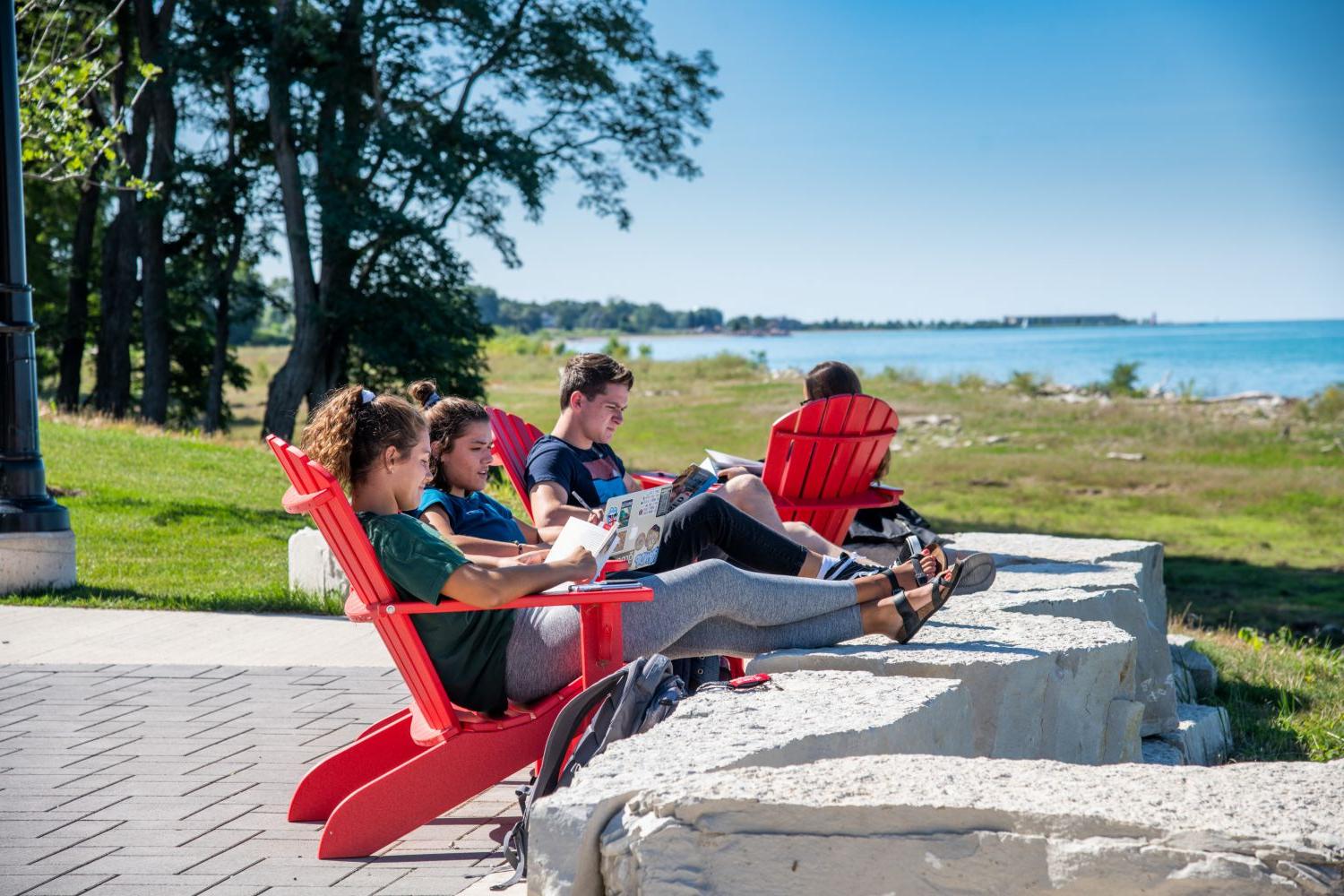 A 博彩网址大全 tradition? Finding a red Adirondack chair and moving it to the best spot for studying ...